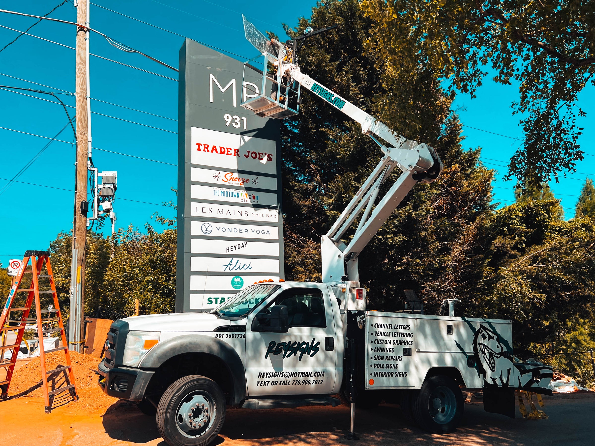 Gwinnett county best storefront signs, car wrap, interior signs-sign installation sign shop - rey signs-LED channel letter signs- RGB backlit signs-cloud signs-backlit signs